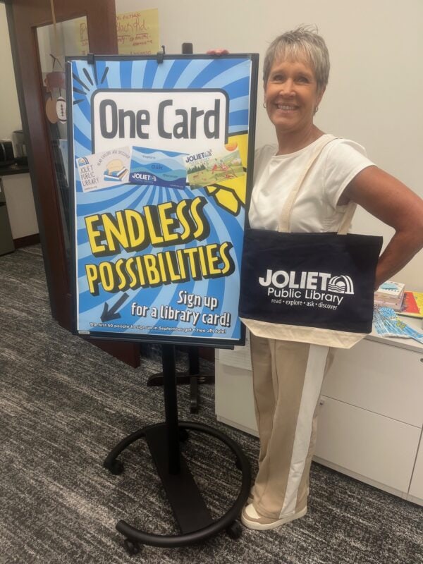 Staff member with JPL tote bag