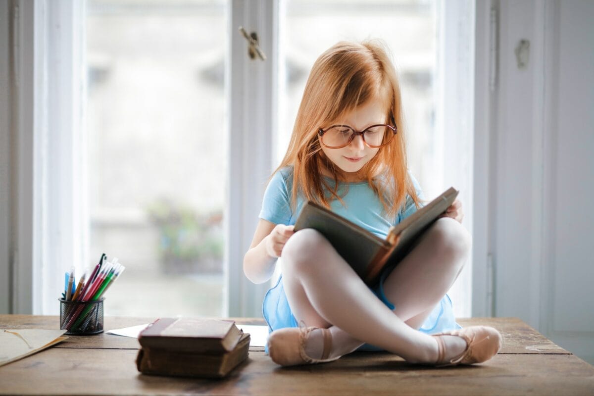 child reading books
